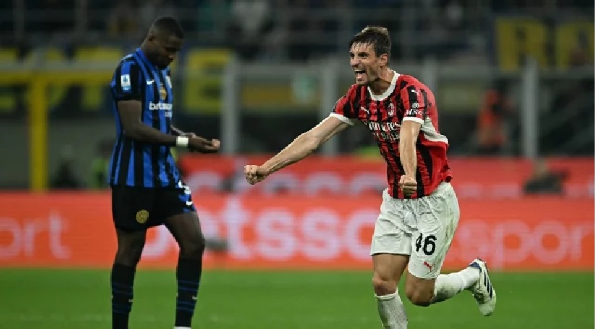 AC Milan's Matteo Gabbia celebrates after scoring against Inter Milan